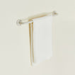 Small towel bar in Ivory with waffle dish towel.