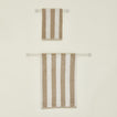 Small and large towel bars in Ivory with striped towels.