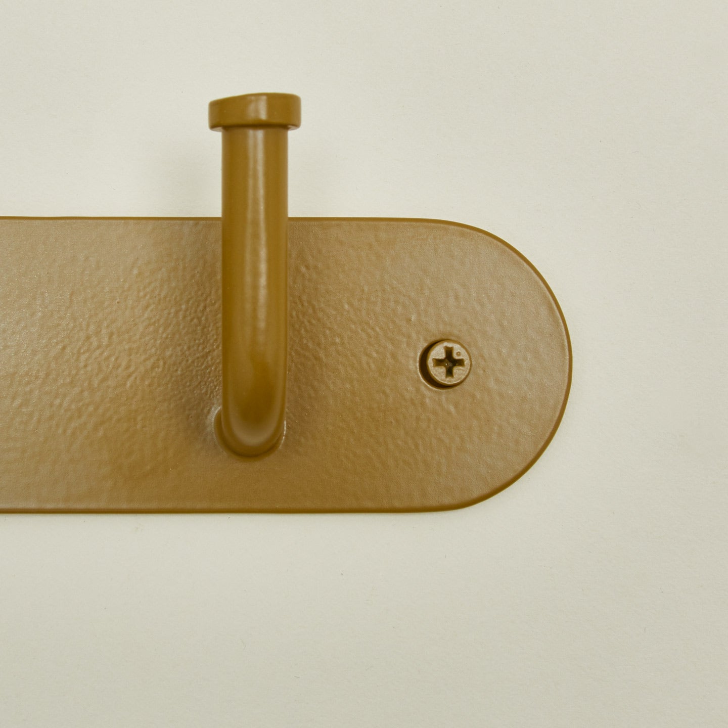 Detailed view of Essential hook rack in mustard