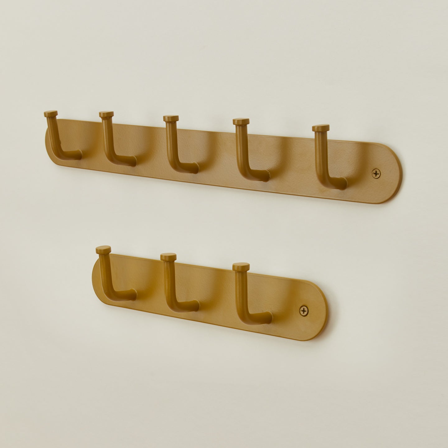 Essential hook racks in mustard