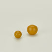 Small and large sphere knob in Mustard.