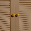 Small mustard essential sphere knobs on louvered doors