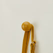 Essential sphere hook in mustard with hanging tote bag