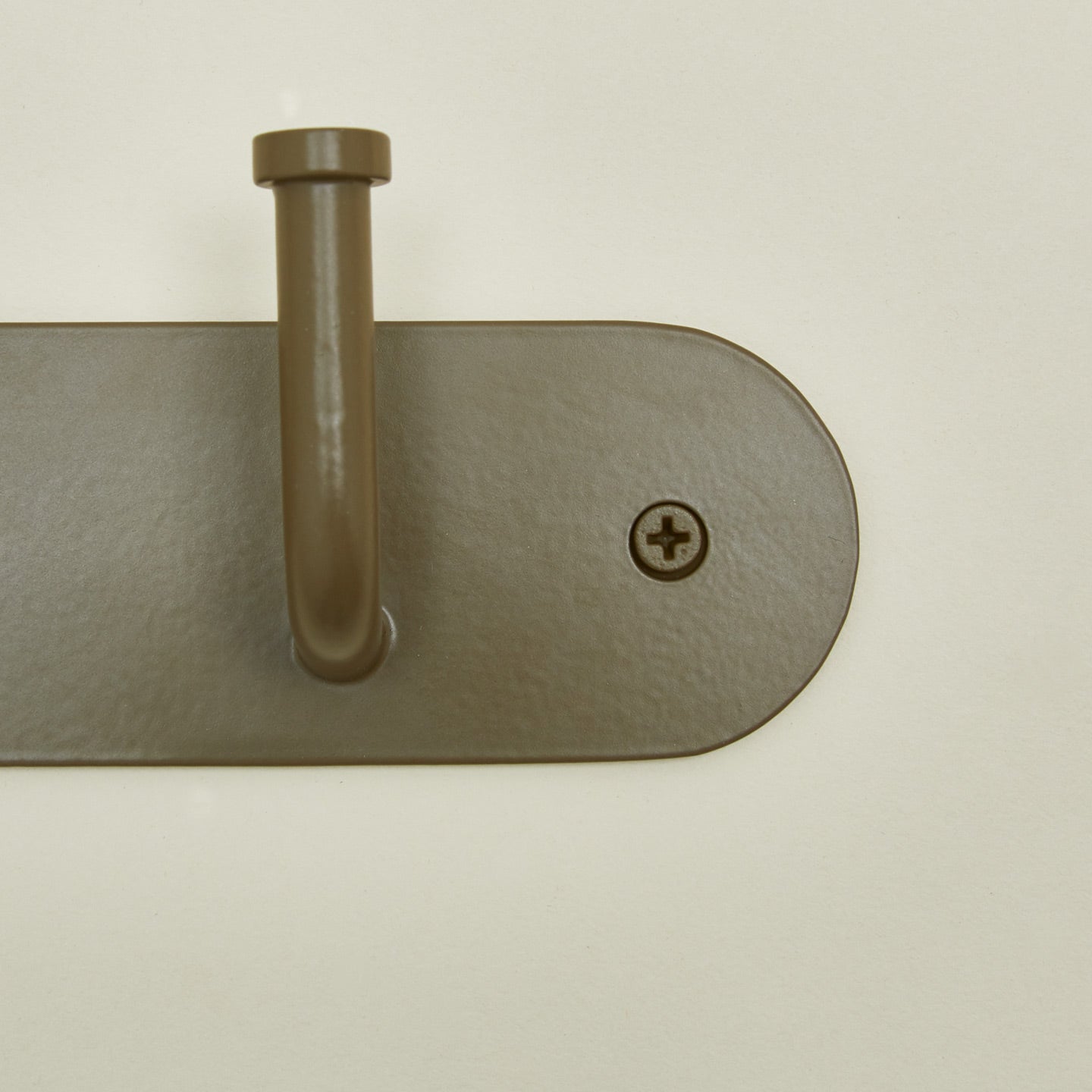 Detailed view of Essential hook rack in olive