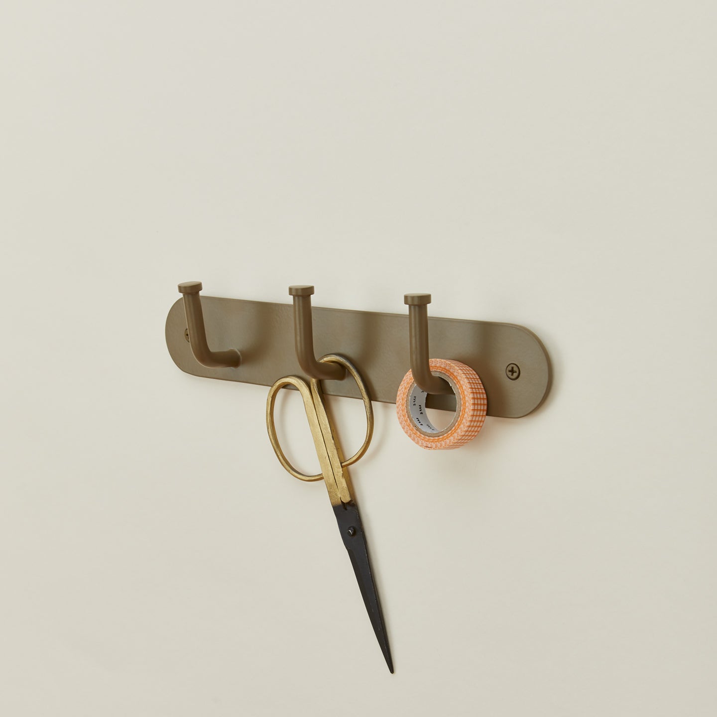 Essential hook rack in olive with scissors and tape
