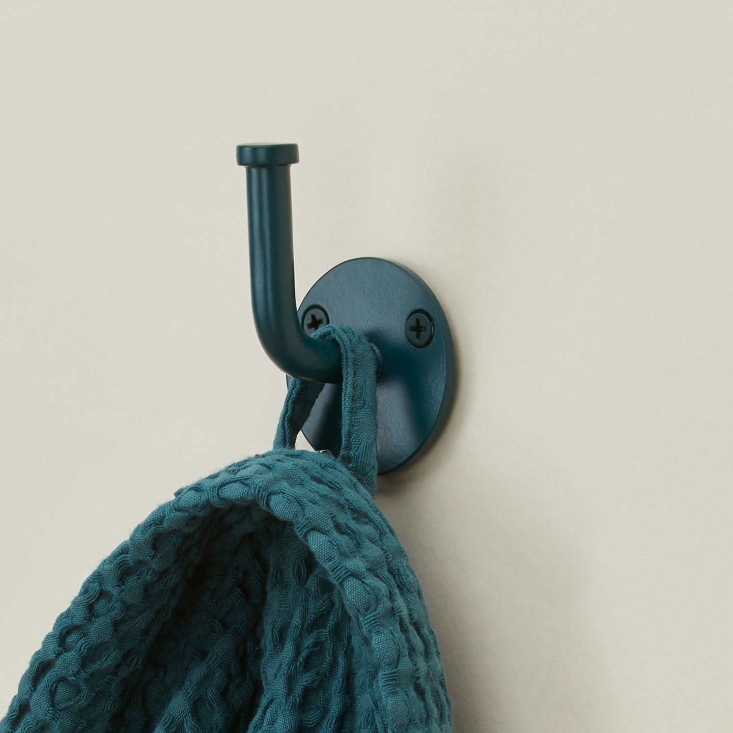 Essential hook in peacock with robe