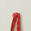 Essential sphere hook in red with hanging tote bag