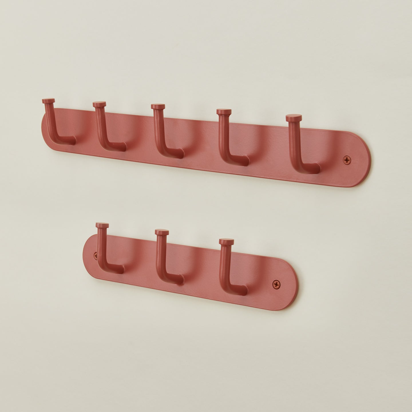 Essential hook racks in terracotta
