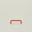 Small drawer pull in Terracotta.