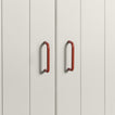 Small terracotta pulls on white doors