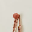 Essential sphere hook in terracotta with hanging tote bag