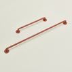 Small and large towel bar in Terracotta.