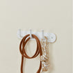 Essential hook rack in white with dog leash and dog toy