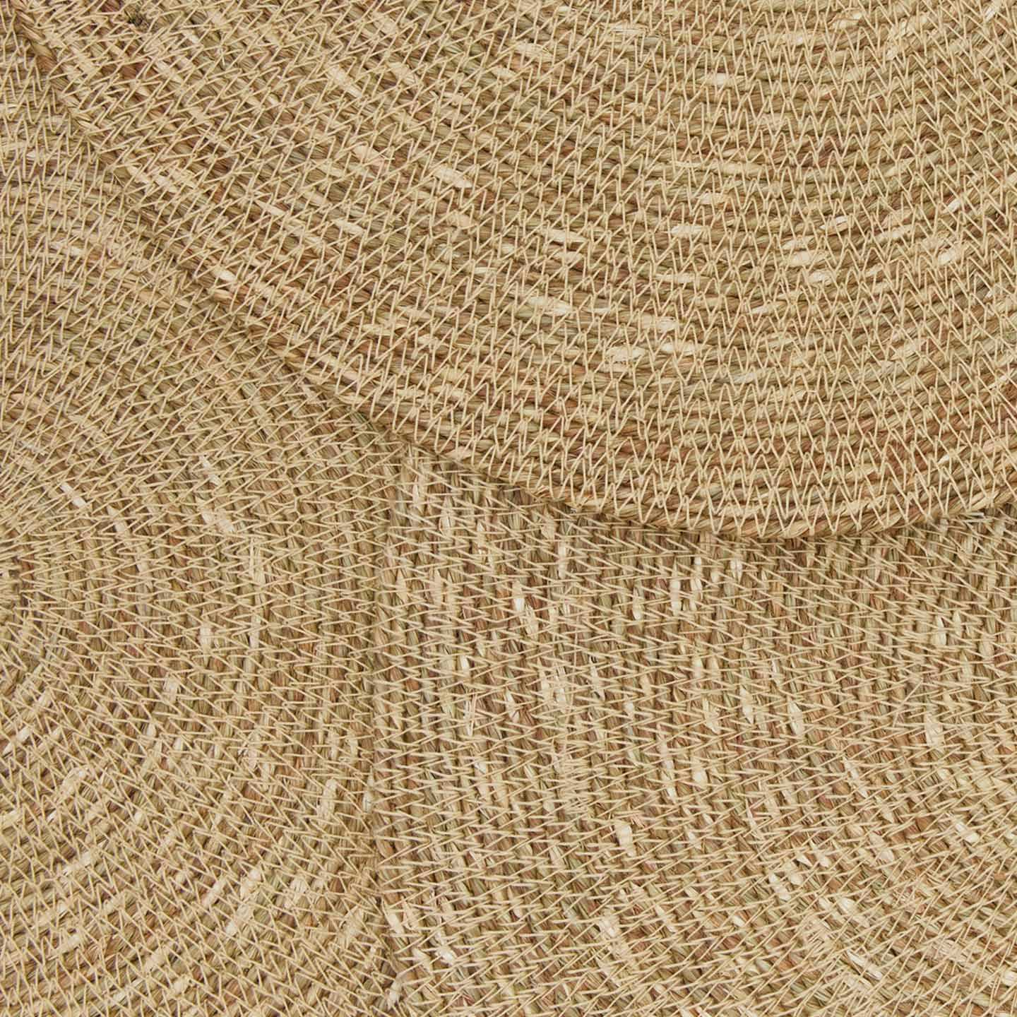 Close up view of essential woven placemats in natural