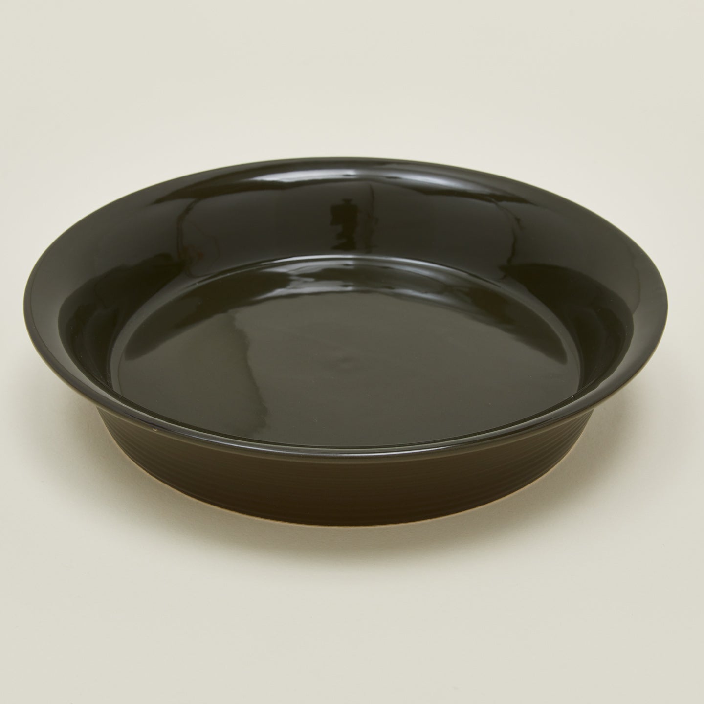 Detailed view of Essential pie dish in olive