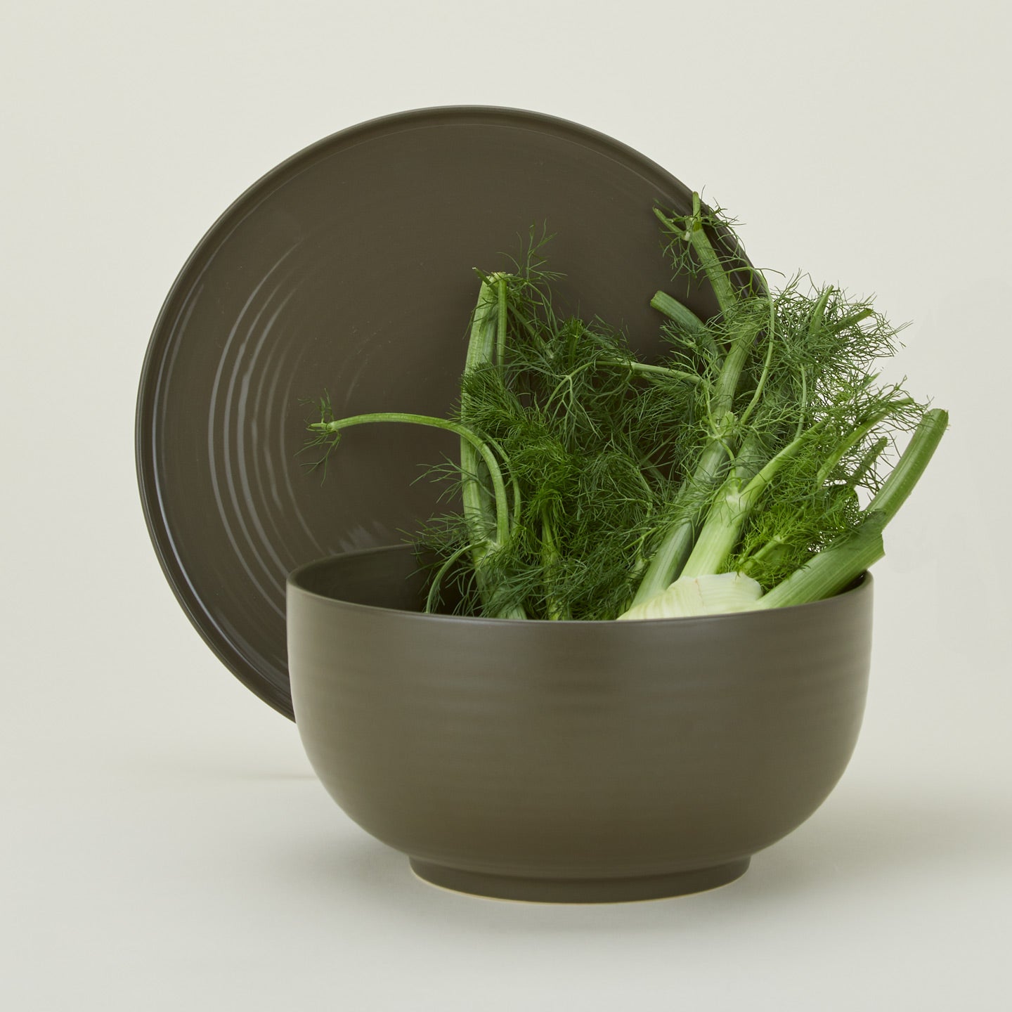Essential Serving Bowl and Serving Platter in Olive, with fennel.