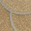 Close up view essential woven placemats in sky.