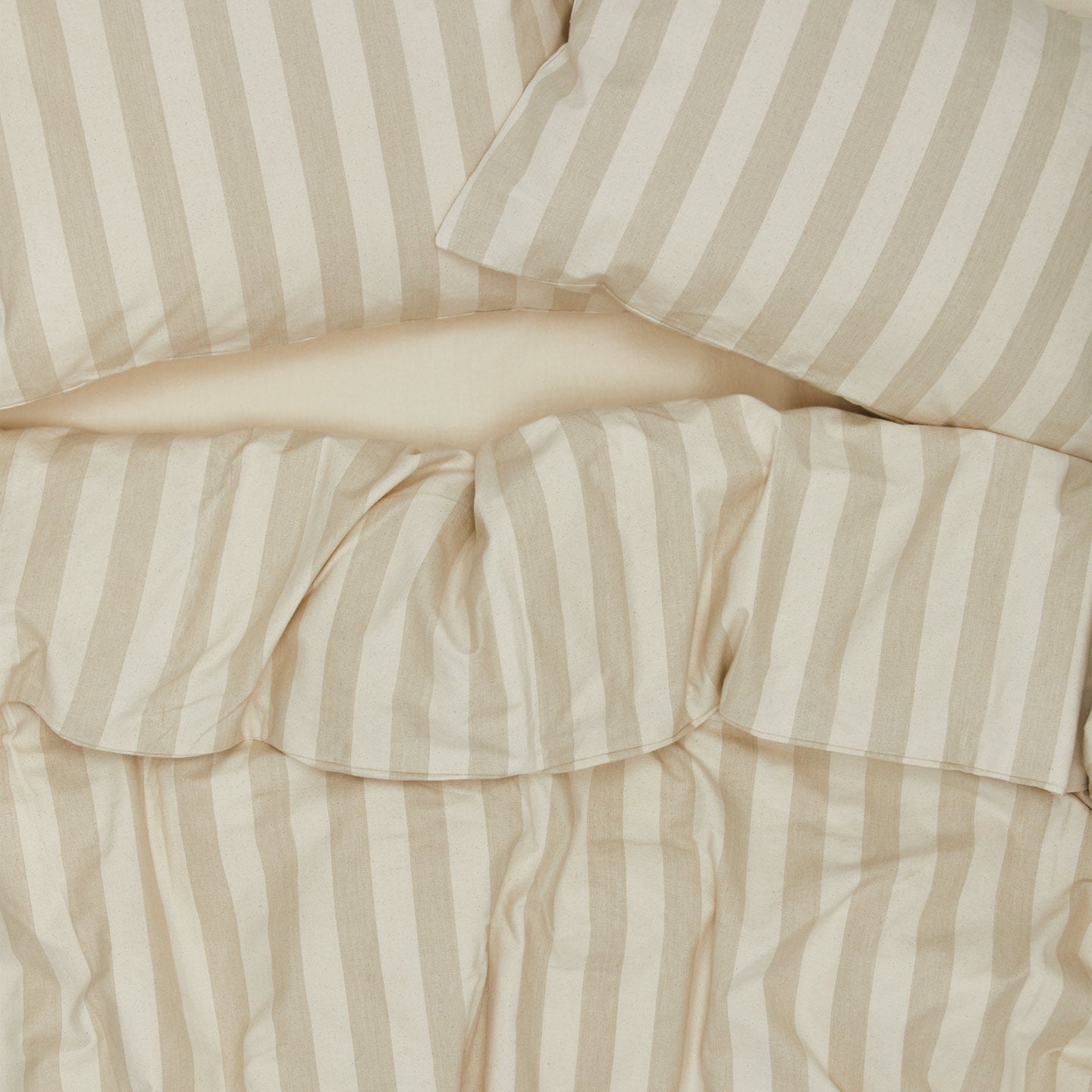 Essential Stripe Duvet - Ivory/Flax on bed with matching pillow cases