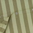 Close up view of essential striped duvet in sage/olive
