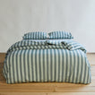 Essential Stripe Duvet - Sky/Peacock on bed with matching pillow cases