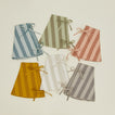 Essential striped tree skirts in various colors