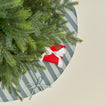 Overhead view of Essential Striped Tree Skirt - Sky/Peacock with tree