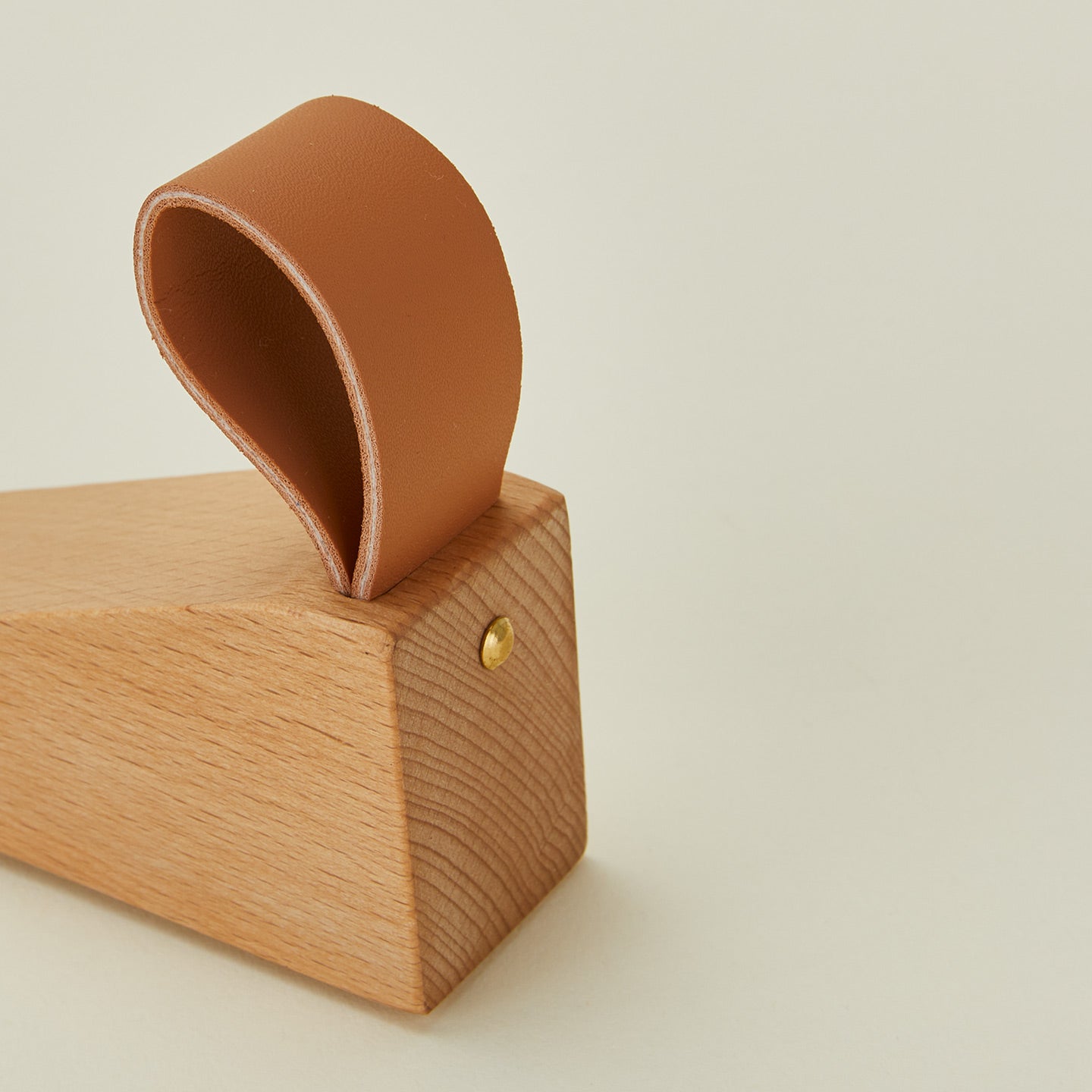 Wood and leather door stopper