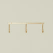 Brass hook rack trio