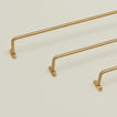 Close up view of brass towel bar family