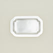 Overhead view of decorative edge rectangular silver tray