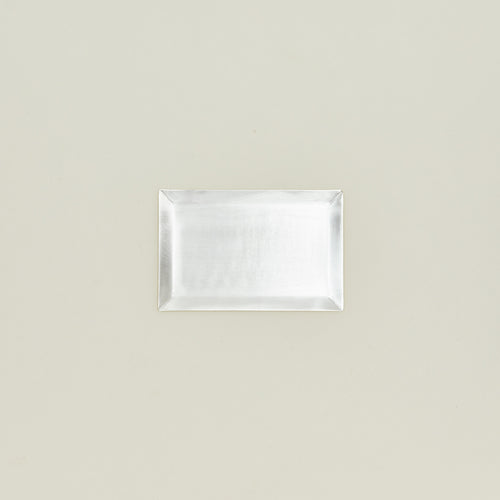 Overhead view of rectangular silver tray