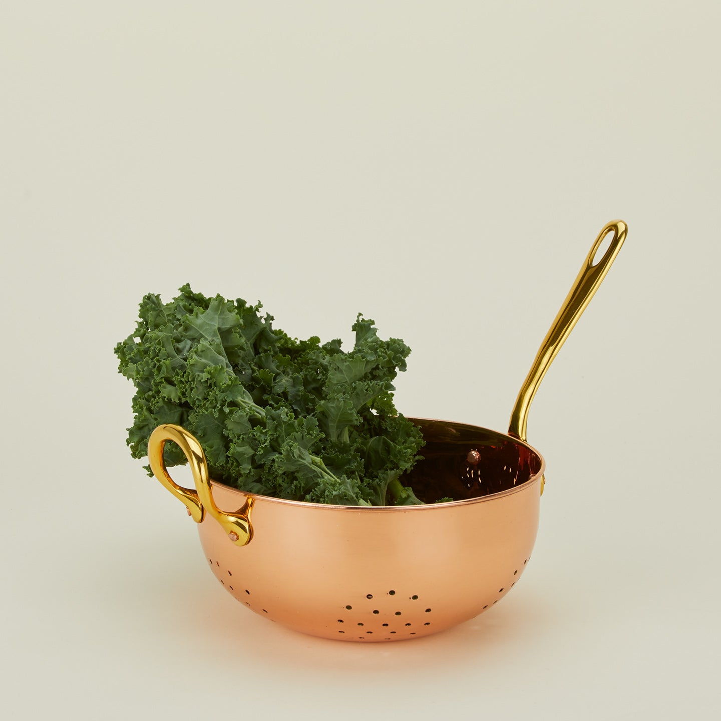 Galley and Fen Copper Colander with kale