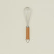 Stainless steel whisk with wooden handle.