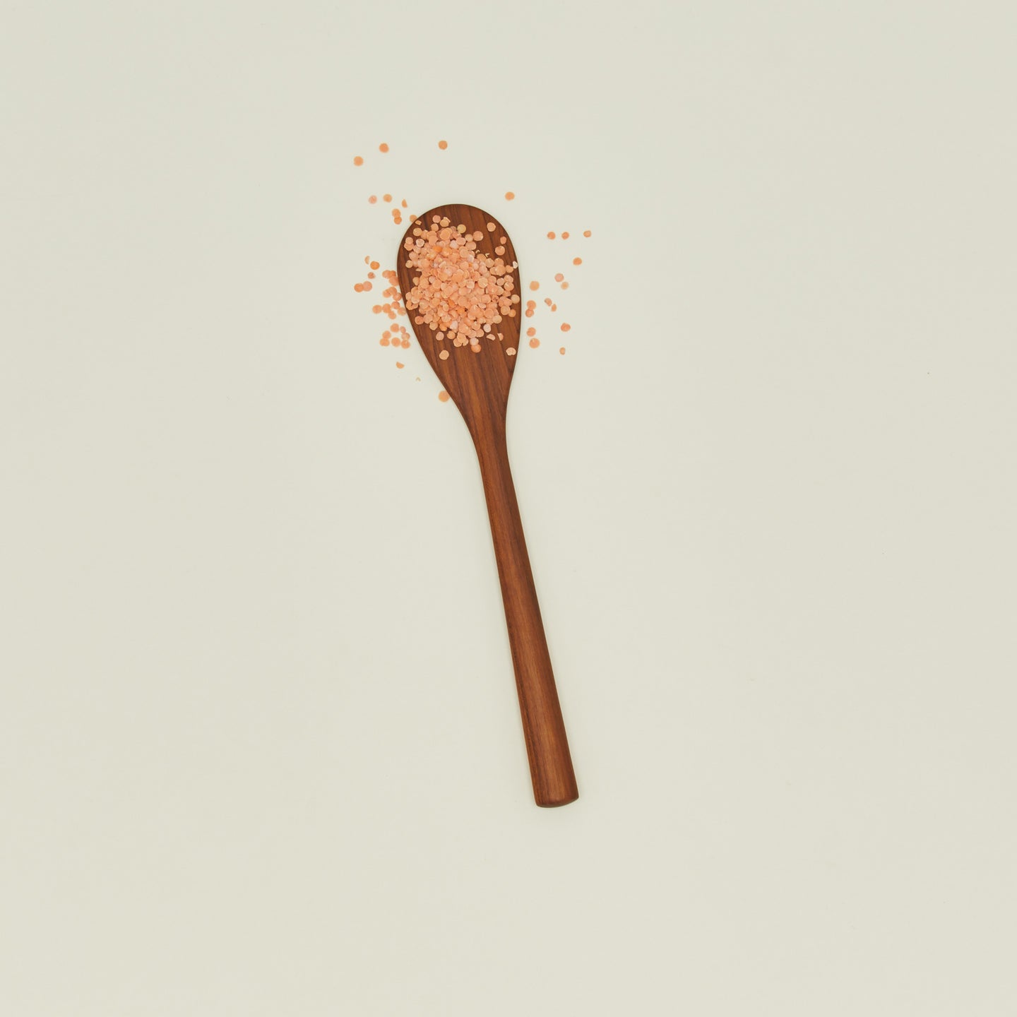 Teak stirring spatula with couscous