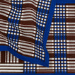 Close up view of Inner Child Shetland plaid table runner