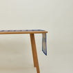 Inner Child Shetland plaid table runner on table.