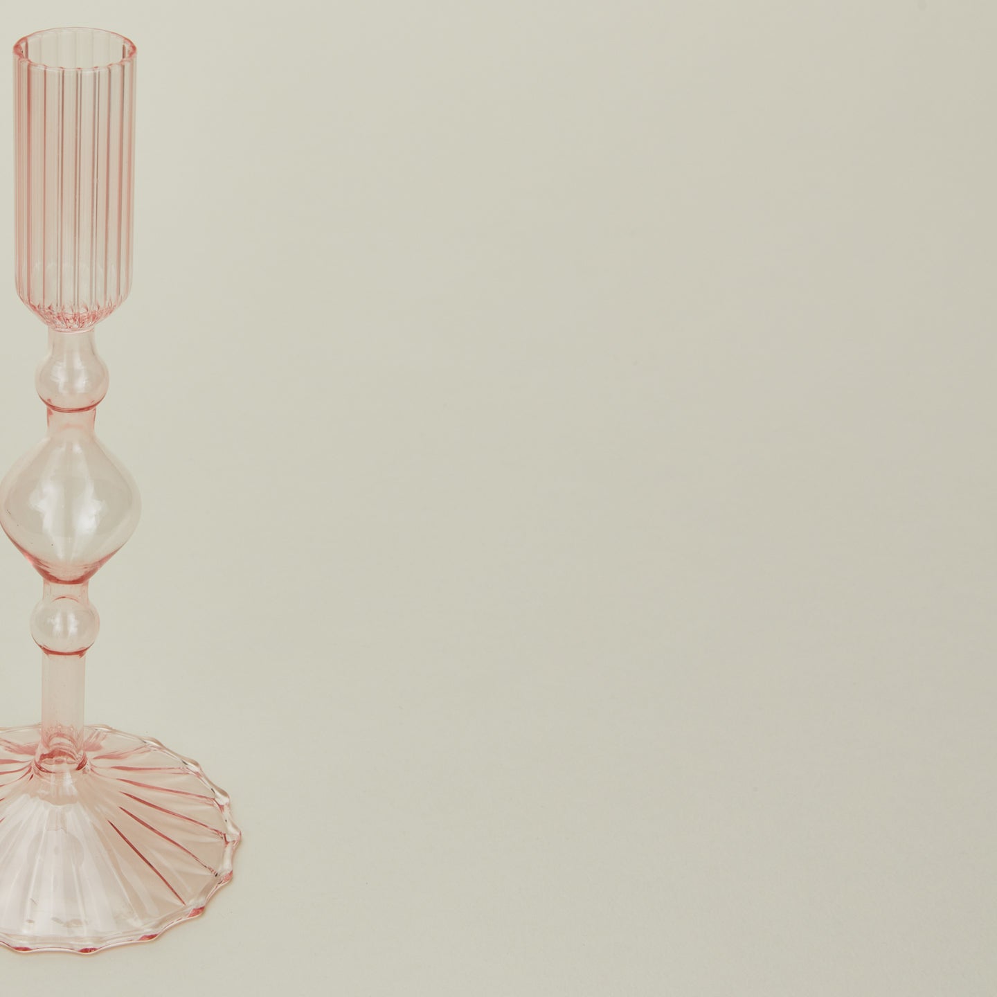 Close up view of Pleated candle holder
 in pink