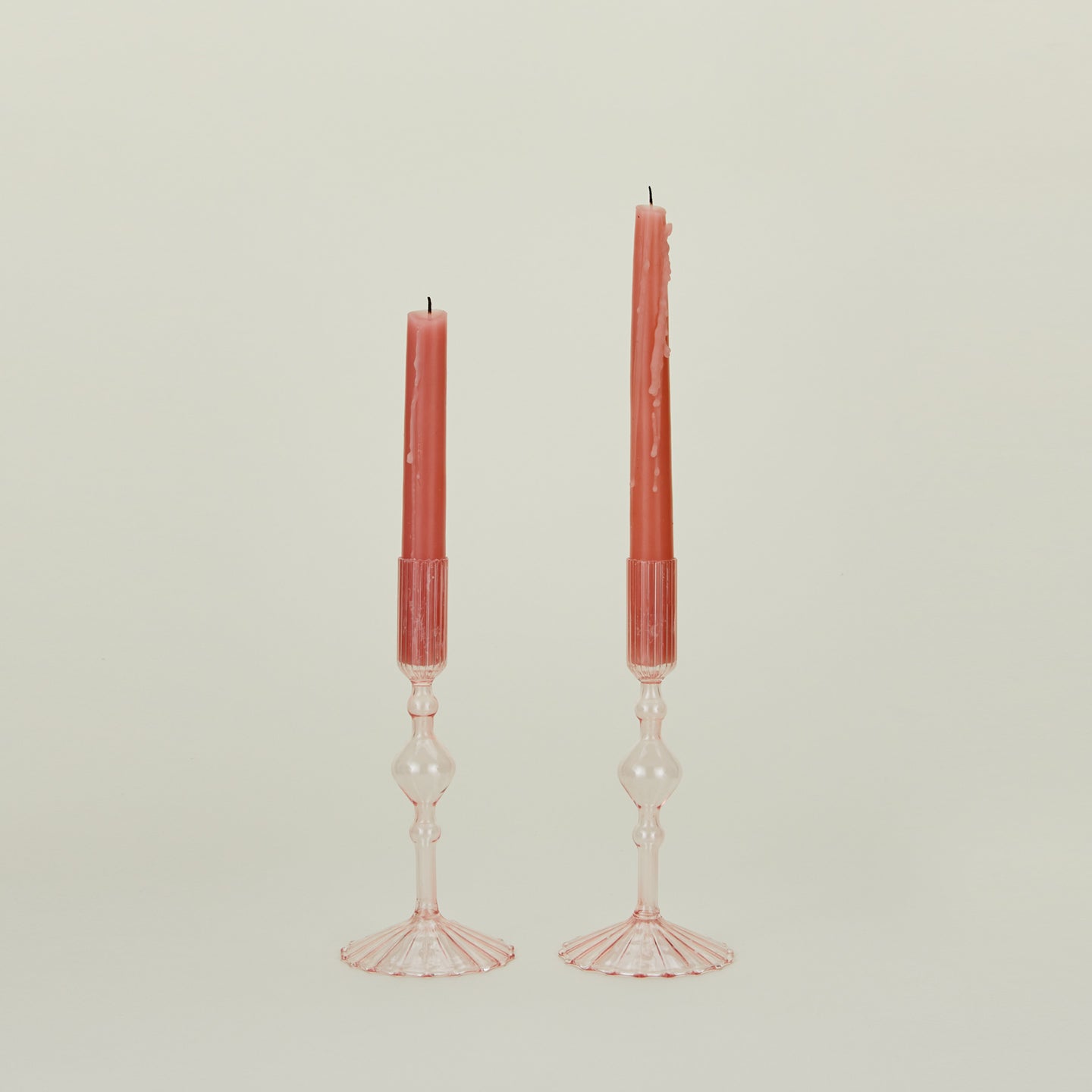 Pleated candle holders in pink with tapers