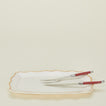 Jean Dubost carving set in red on a rectangular platter