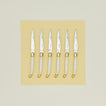 Jean Dubost steak knives set of 6 on yellow paper