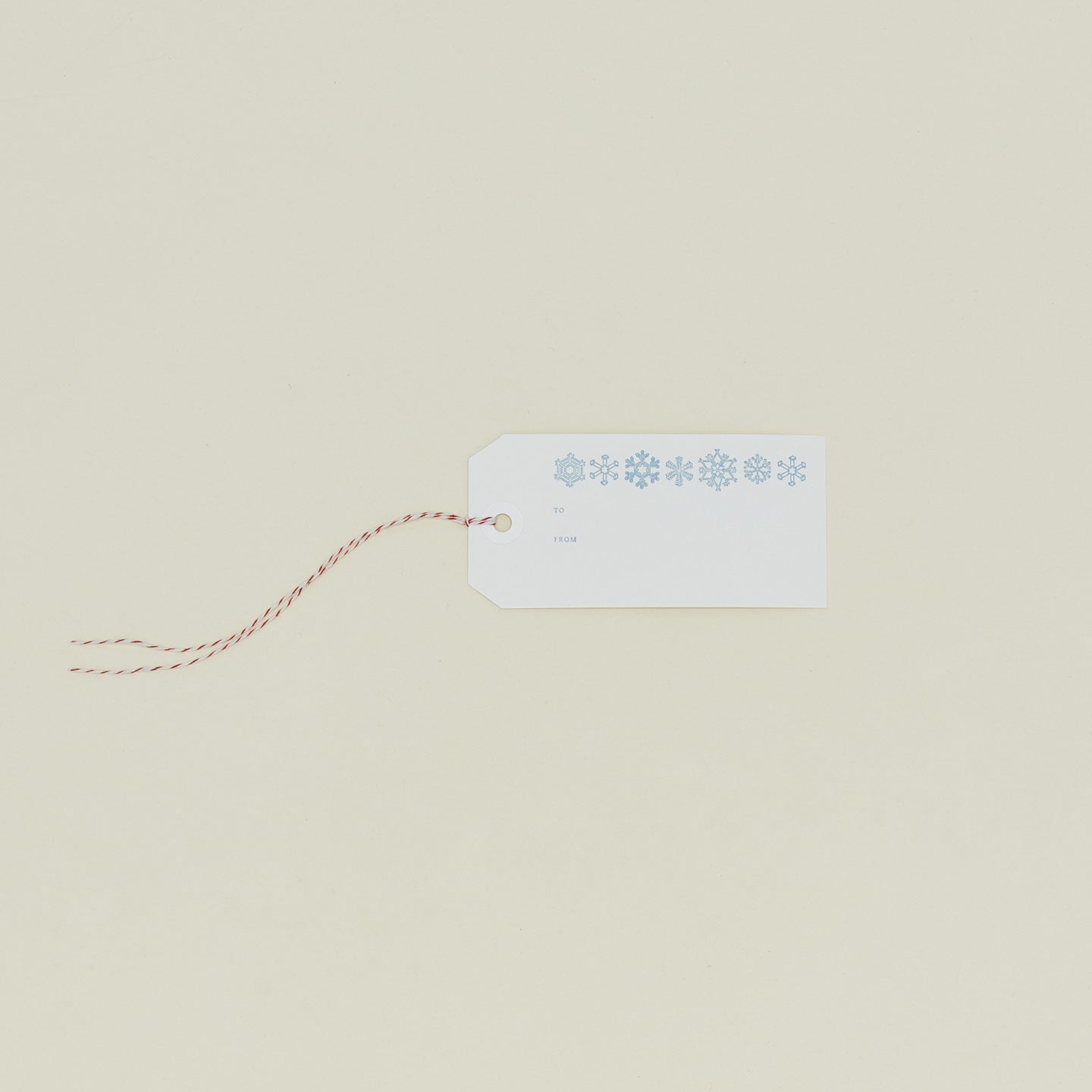 Snowflakes Gift Tag on neutral background
