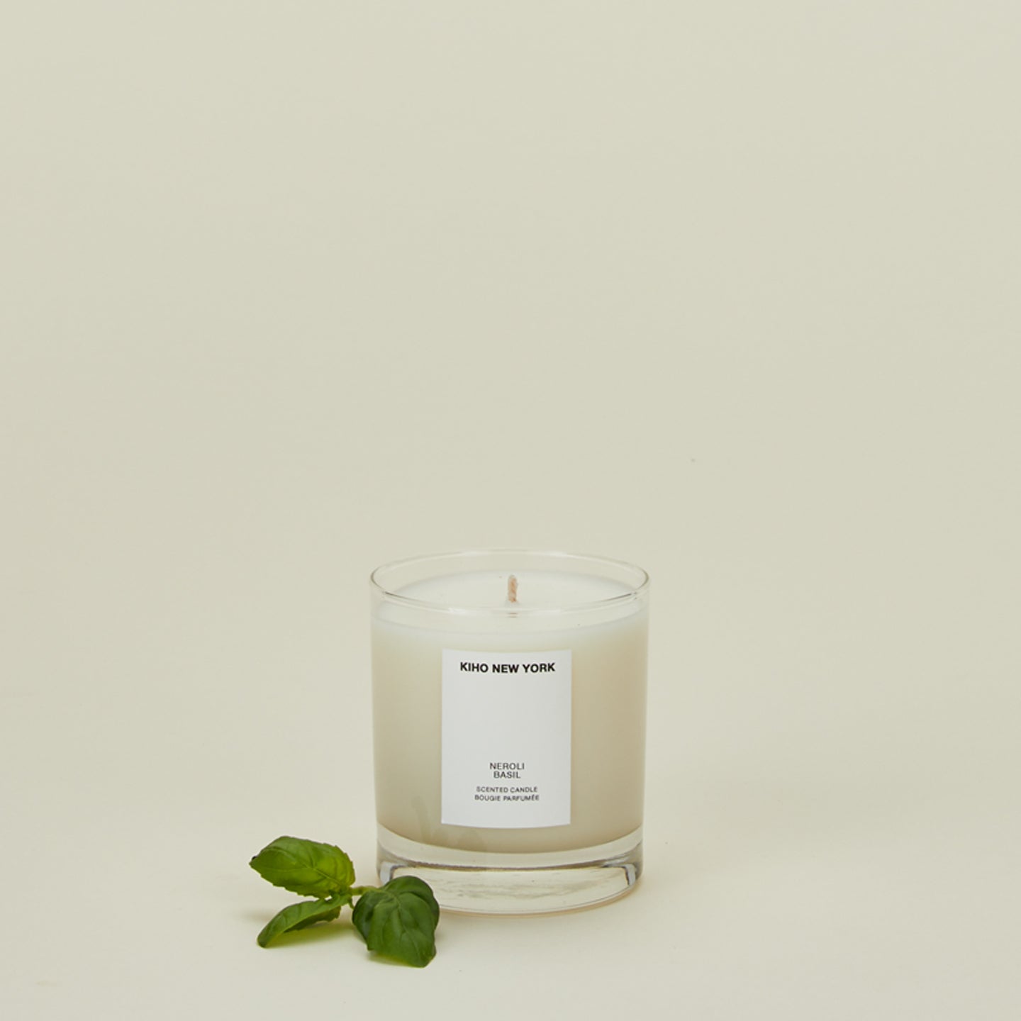 Basil candle with basil leaves