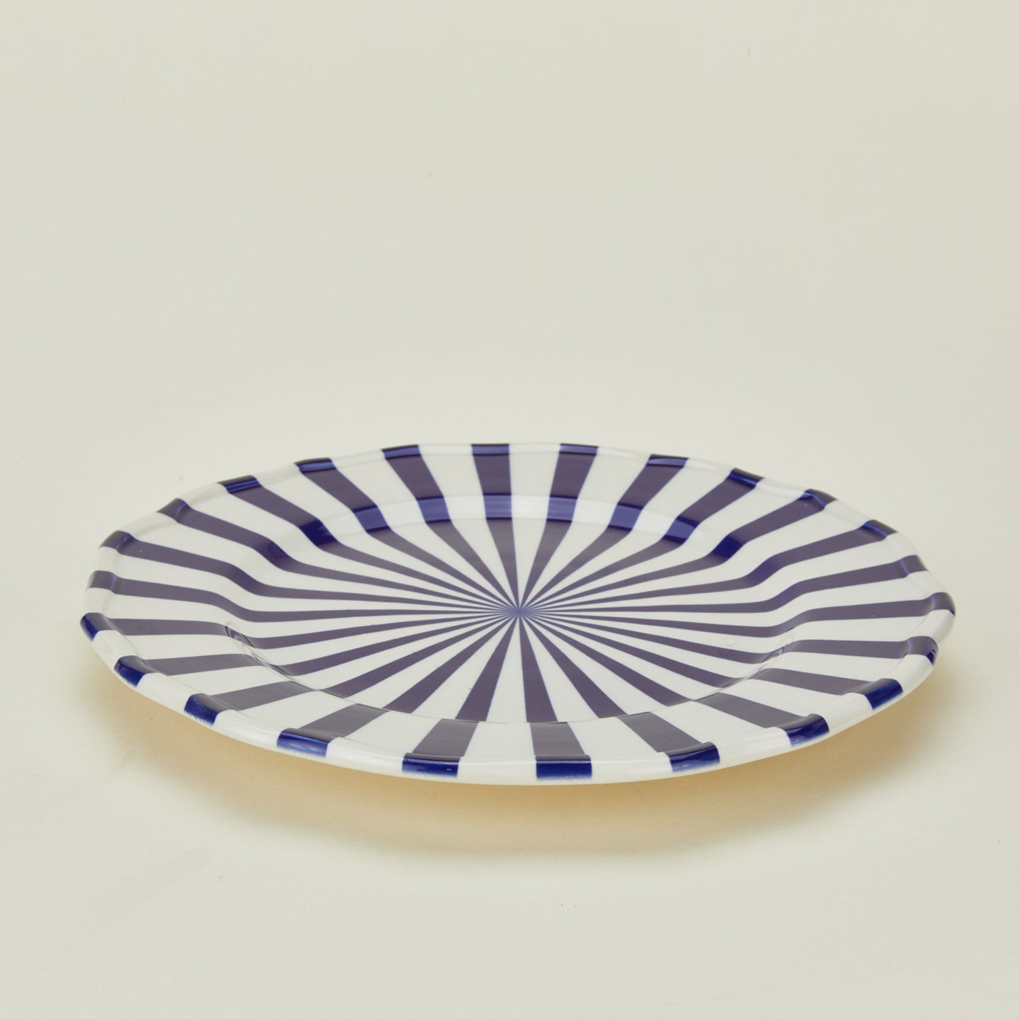 Close up view of Maison Madison starburst salad plate