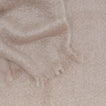 Close up view of solid mohair throw in lilac