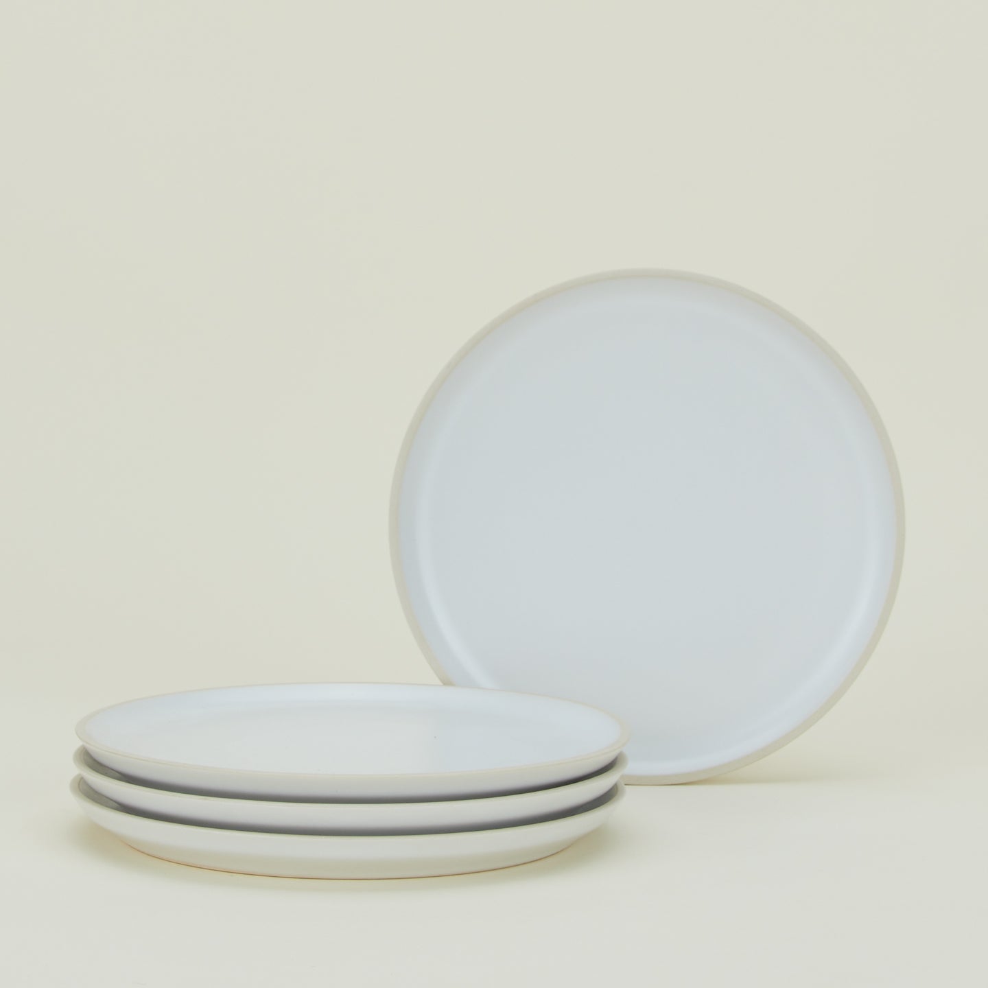 Four Modernist Salad Plates.