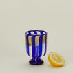 Blue striped wine glass with lemon