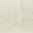 Close up view of Set of 3 grid baskets in chalk
