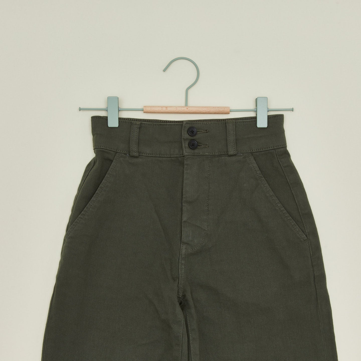 Clip hanger in sage with pants