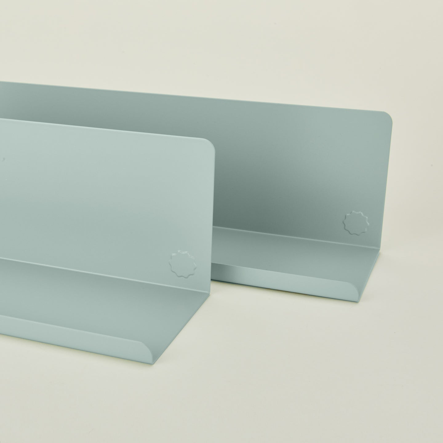 Close up view of Ledge shelves in sage