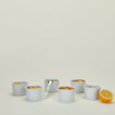 Deep porcelain ramekin in white with orange